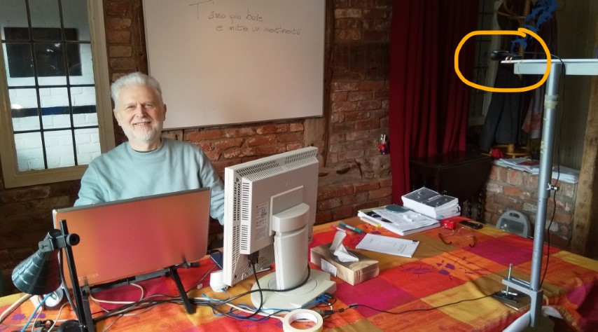 lorenzo in front of computers teaching online